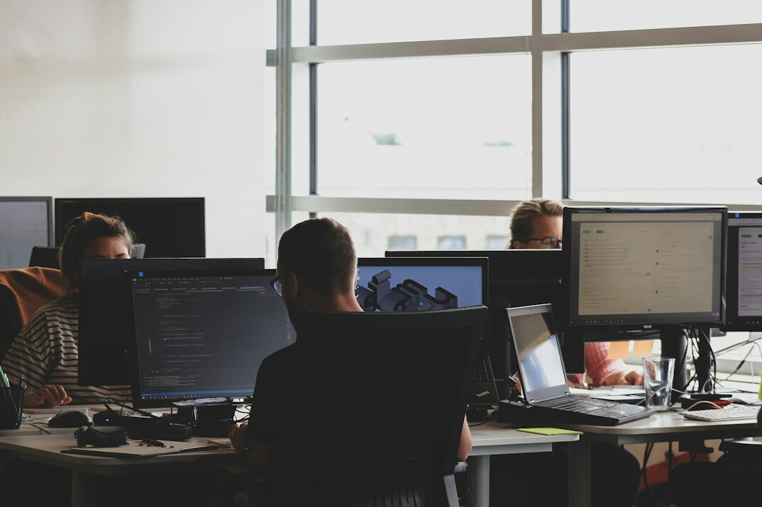 team using software in office