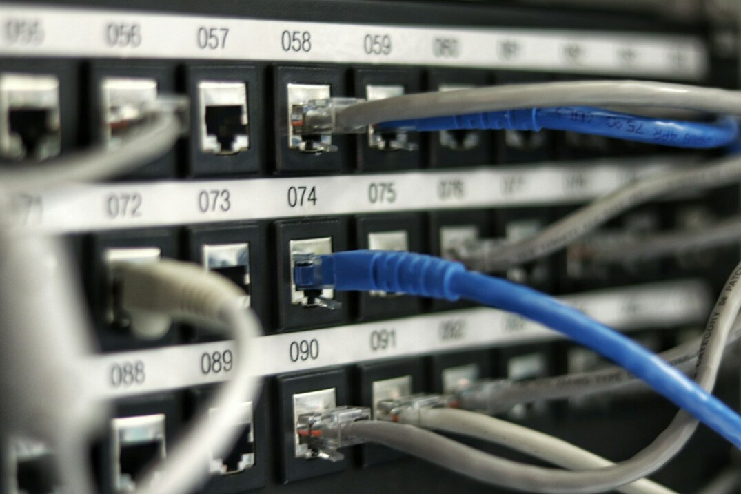 Rows of server racks in a modern data center